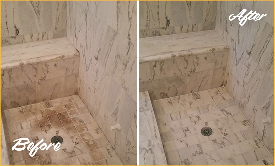 Before and After Picture of a Punta Gorda Marble Shower Honed to Remove Dark Stains